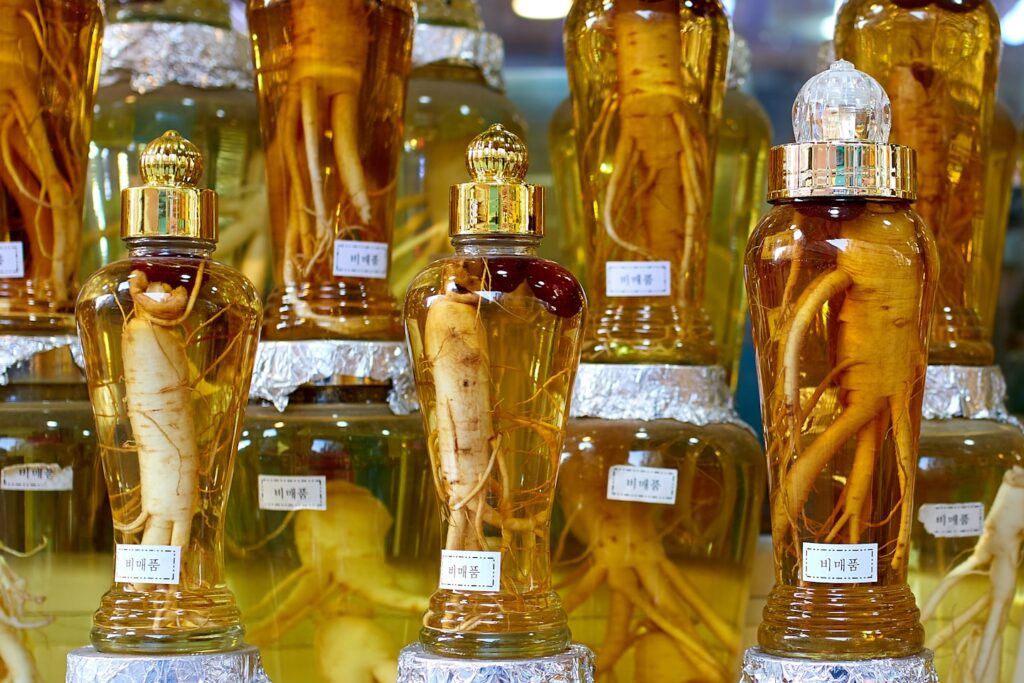 Glasses of ginseng in a South Korean traditional Chinese medicine store.