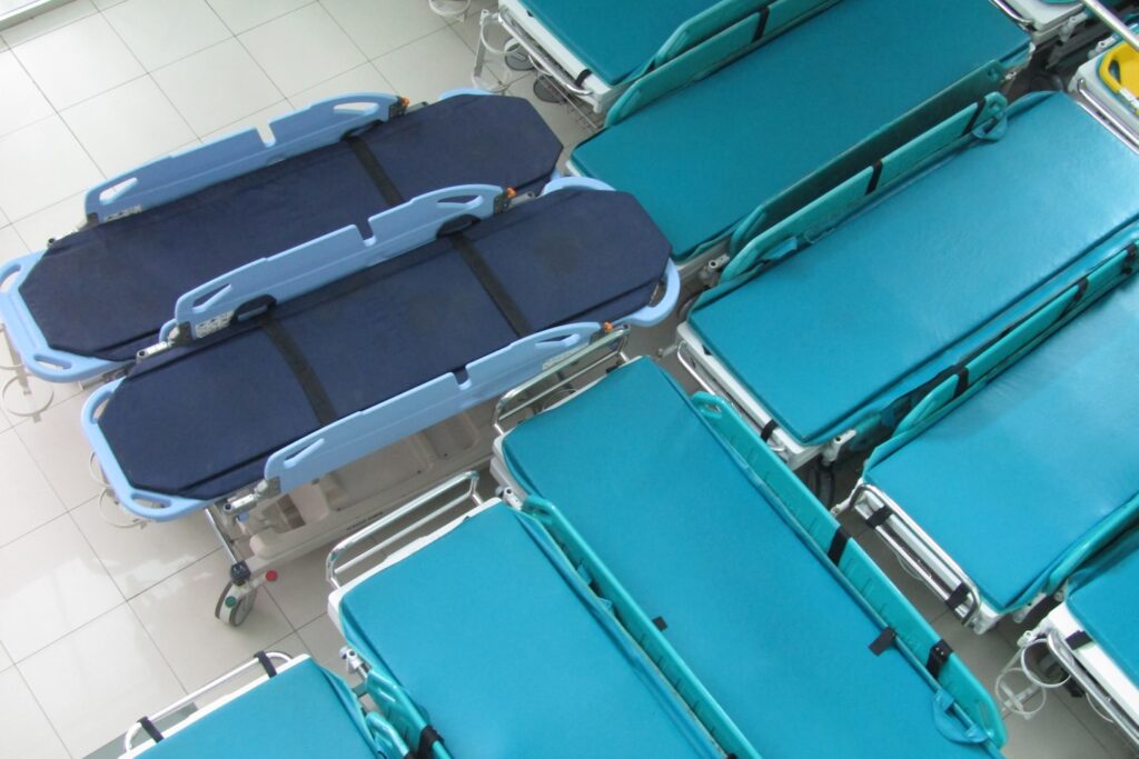 the patient bed is in the hospital emergency room