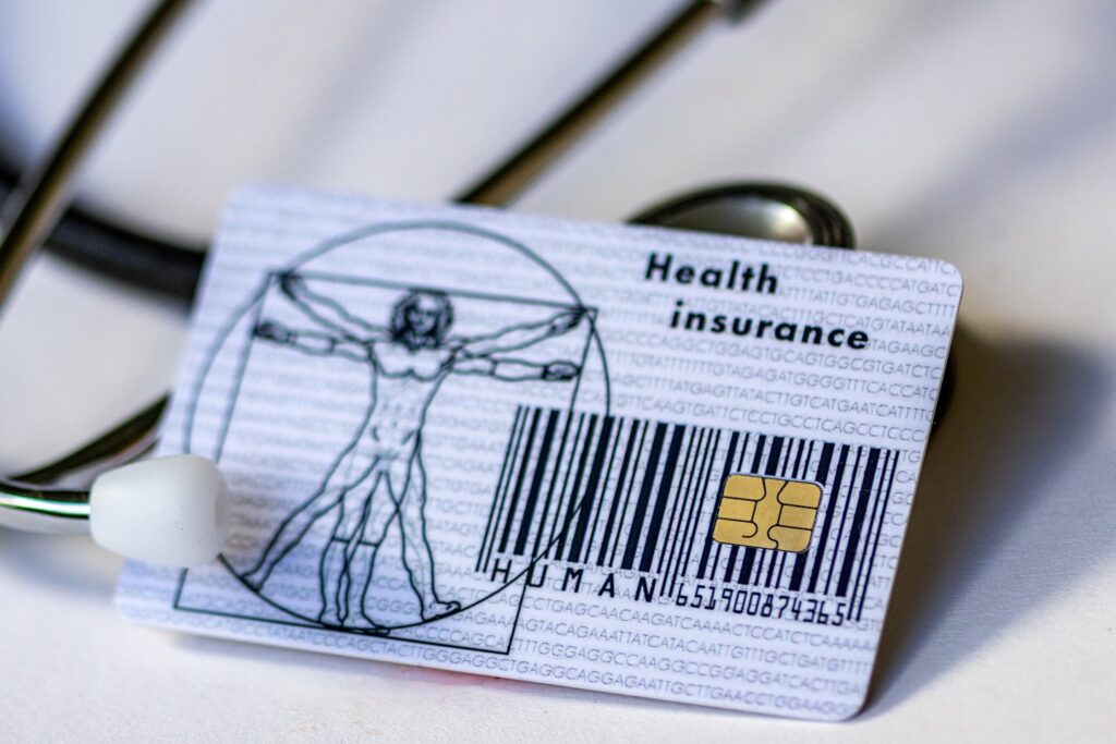a health card and a stethoscope